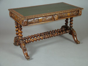 Appraisal: A carved oak two drawer side table circa with all