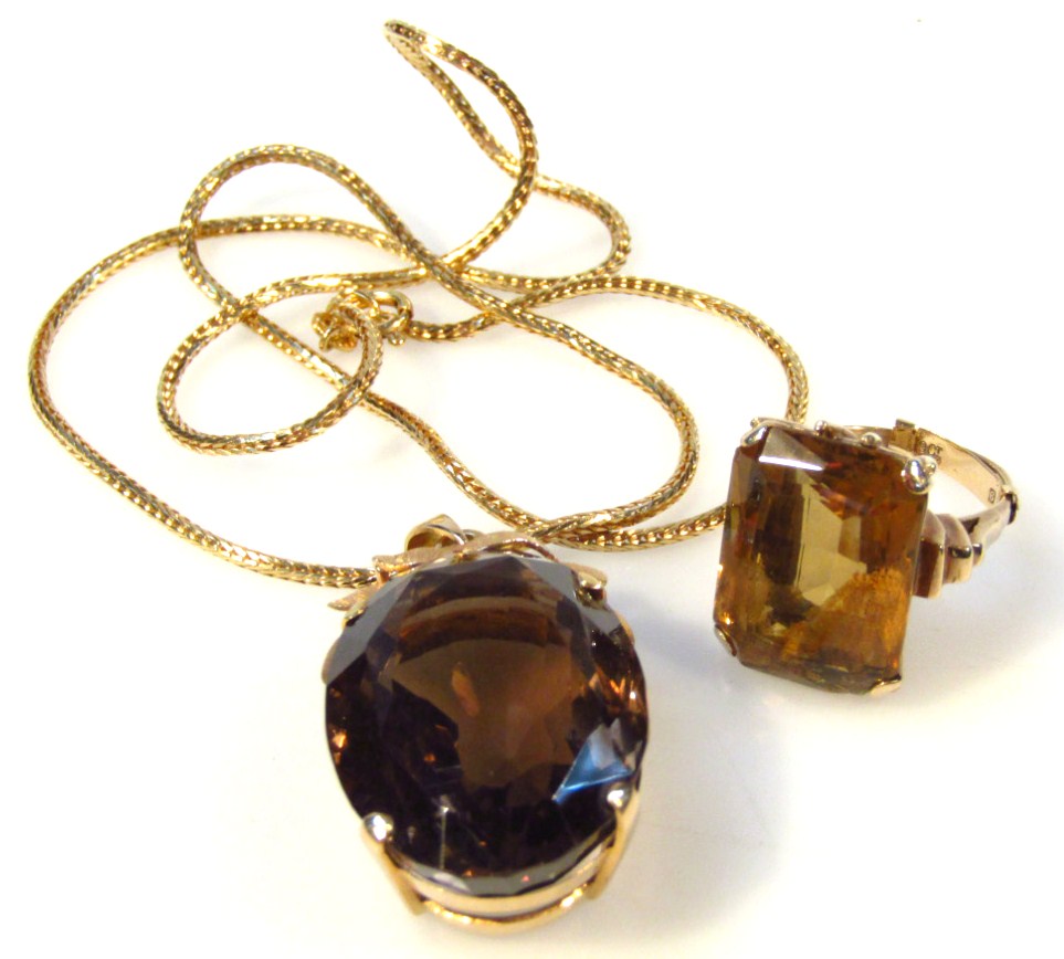 Appraisal: A smoky quartz jewellery set comprising dress ring size N