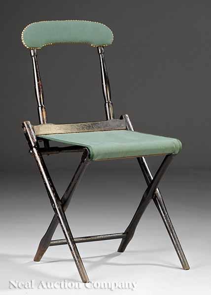 Appraisal: An Ebonized Folding Yacht Chair c stenciled Richard J Delaney