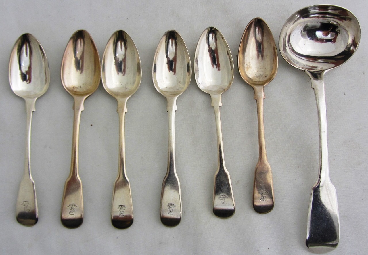 Appraisal: Silver fiddle pattern table flatware comprising a sauce ladle London