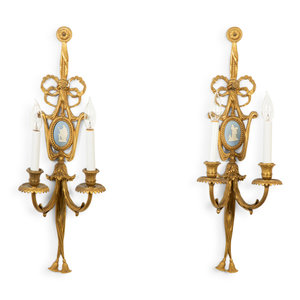 Appraisal: A Pair of Gilt Metal Two-Light Wall Appliques inlaid with