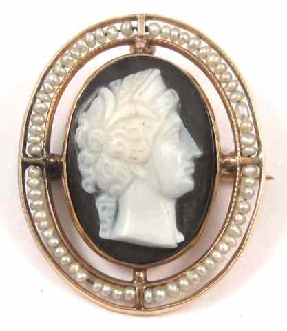 Appraisal: CAMEO AND SEED PEARL PENDANT BROOCH the cameo with black