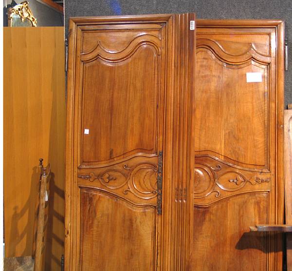 Appraisal: A Louis XV chestnut and fruitwood armoire third quarter th