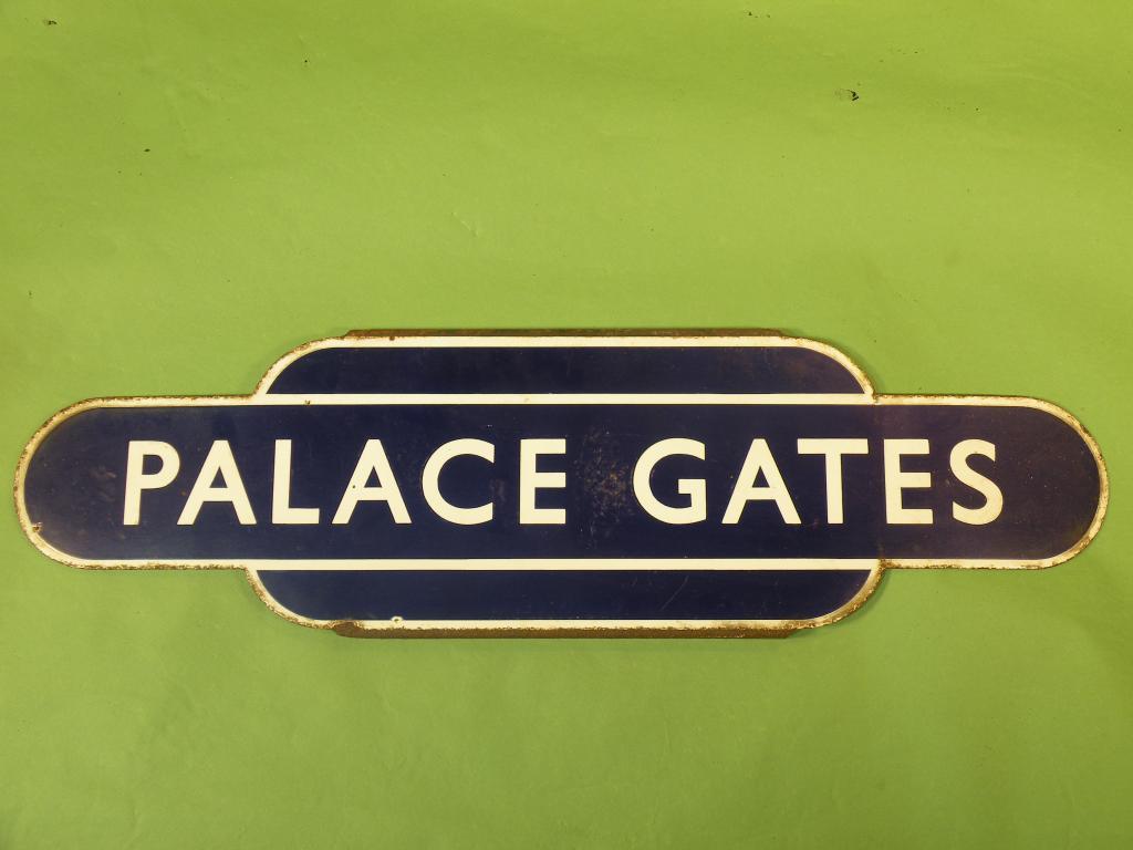 Appraisal: An enamel railway sign 'Palace Gates' with white lettering on