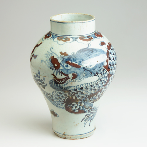 Appraisal: Korean porcelain dragon jar of baluster form with collar neck