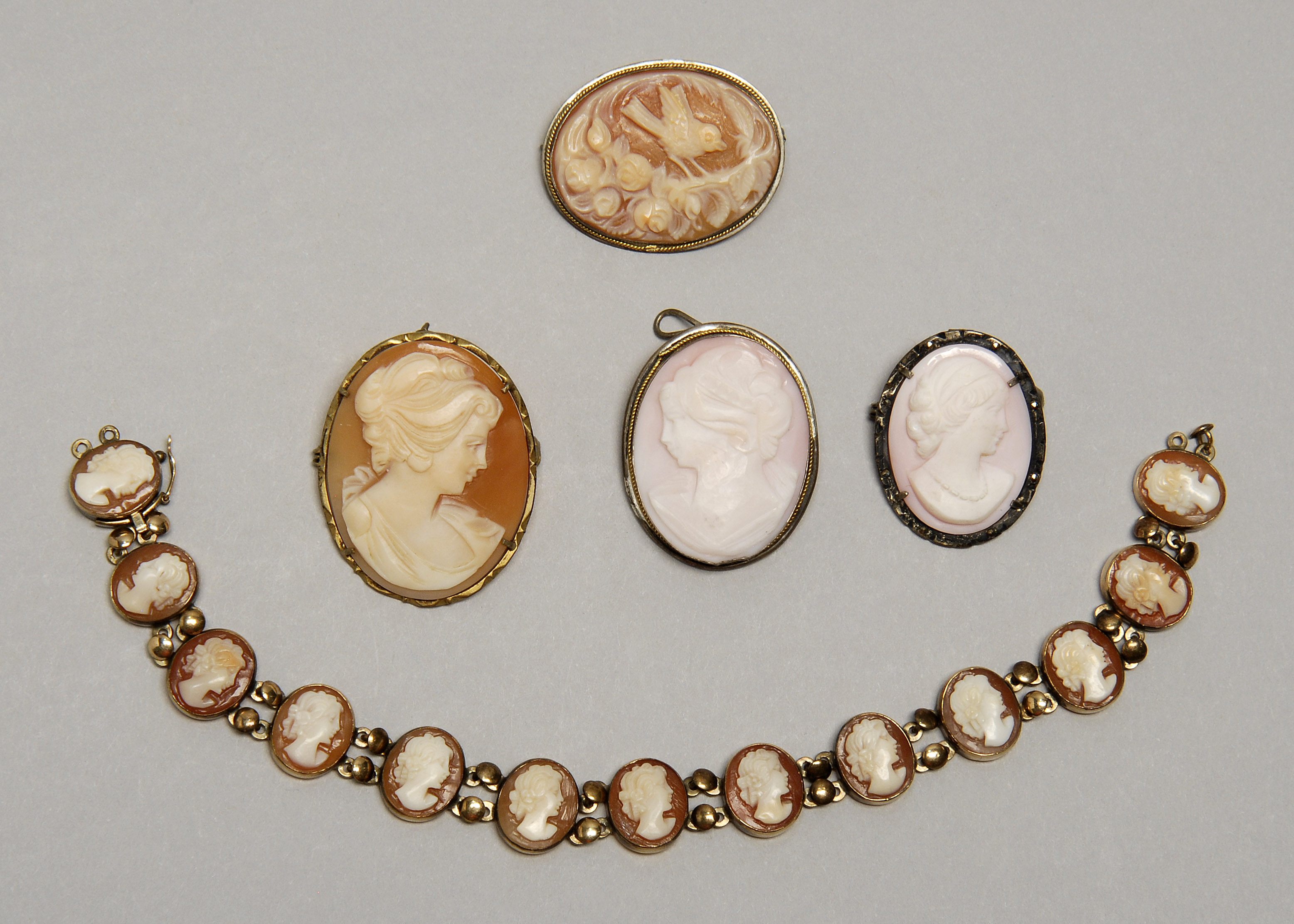 Appraisal: FIVE PIECES OF CAMEO JEWELRY Includes an bracelet consisting of