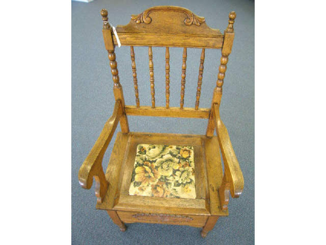 Appraisal: Oak Victorian Potty Chair lift seat hidden compartment spindle back