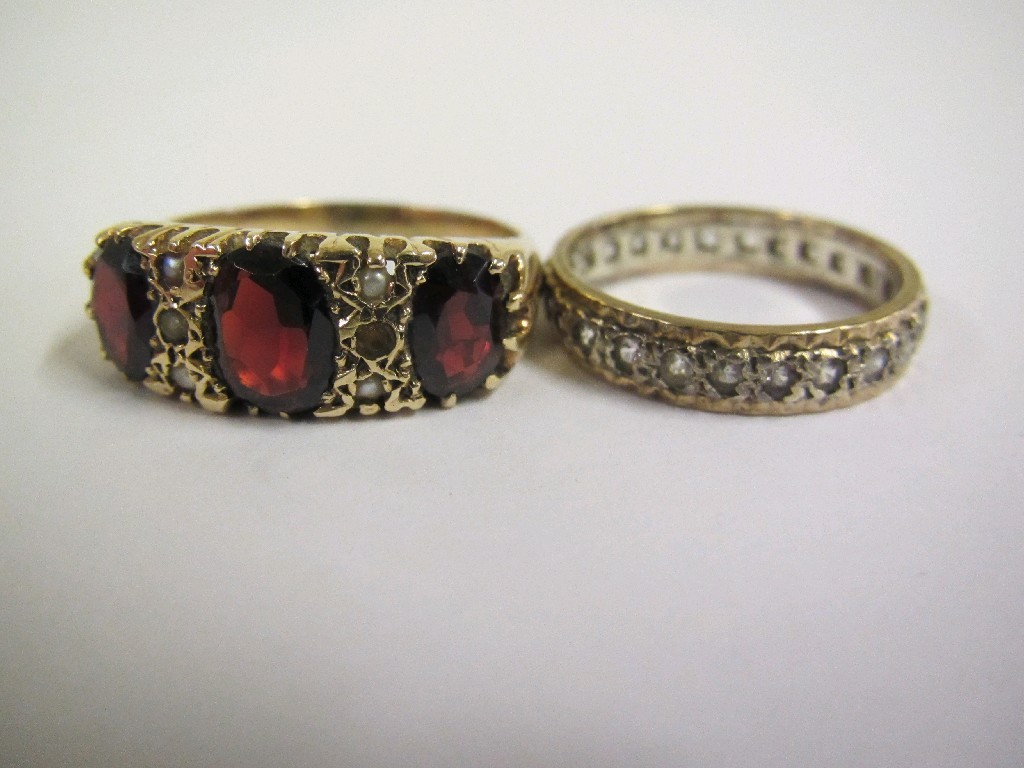 Appraisal: Lot comprising gold garnet and seed pearl set dress ring