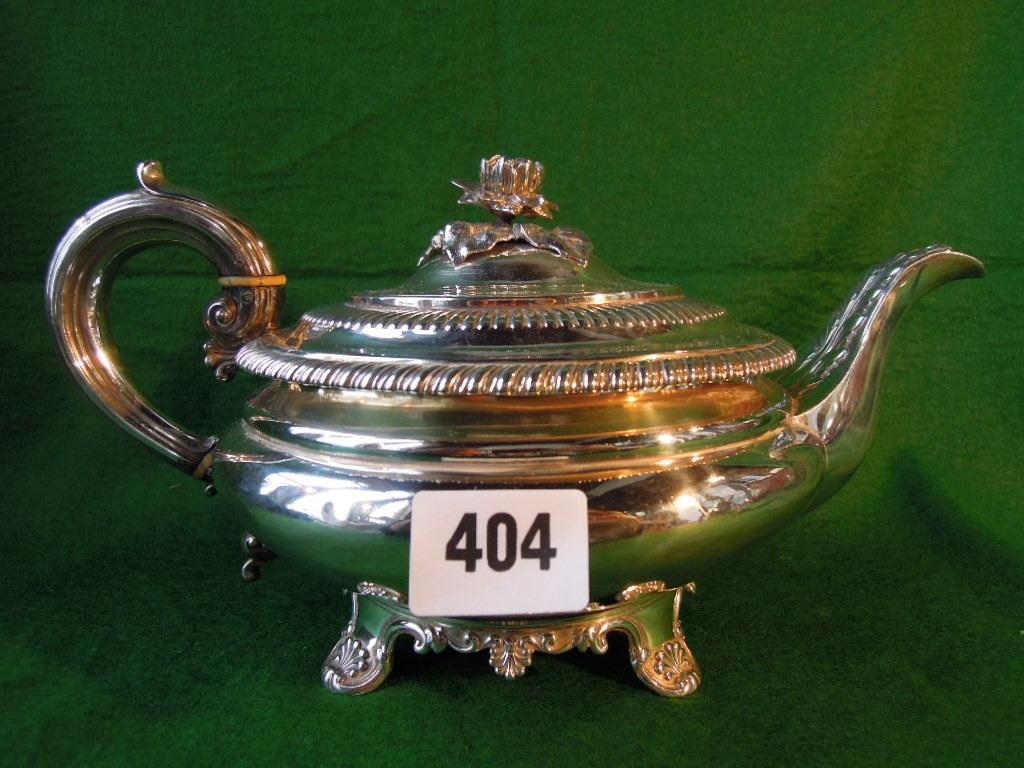 Appraisal: A substantial George IV silver teapot with acanthus leaf to