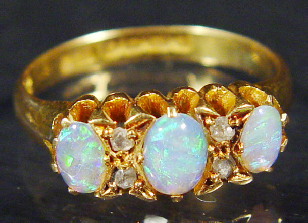 Appraisal: ct gold three stone opal ring