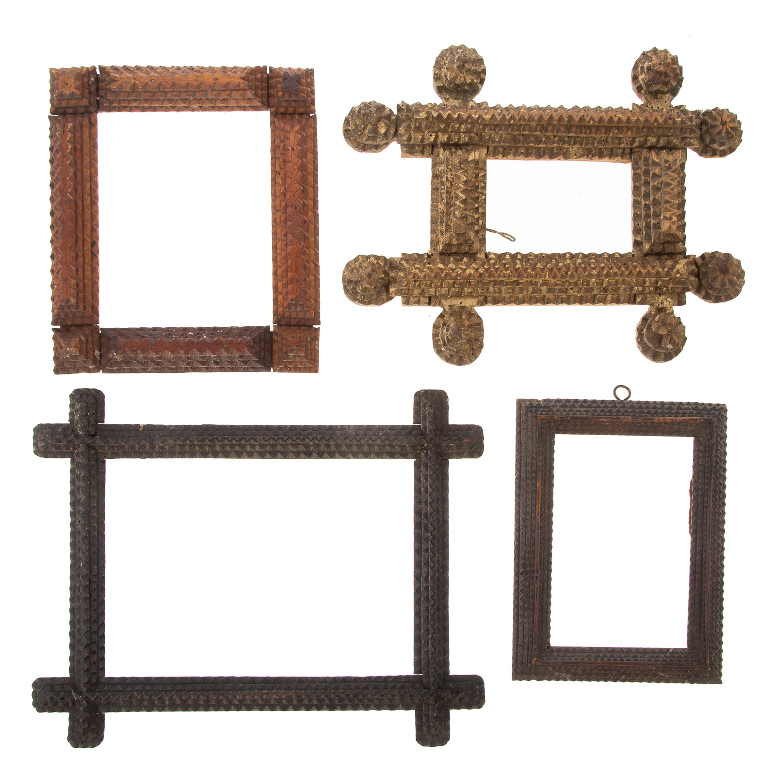 Appraisal: FOUR TRAMP ART NOTCH CARVED FRAMES One gold painted size