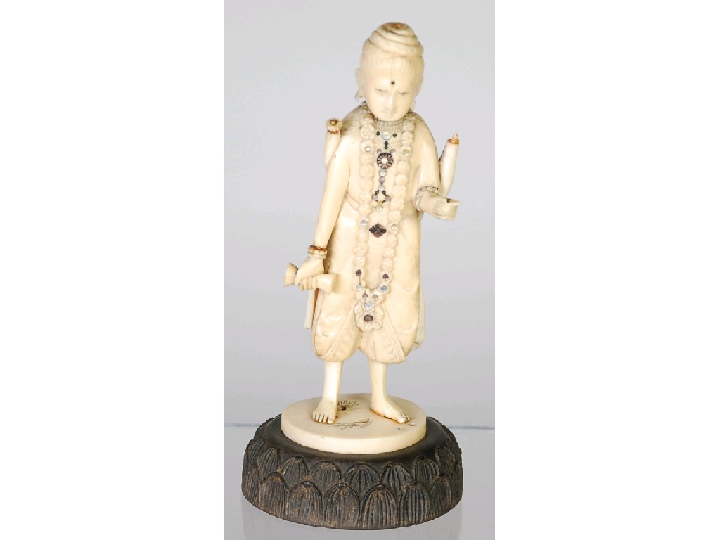 Appraisal: ORIENTAL CARVED IVORY AND SHIBAYAMA FIGURE OF A DEITY with