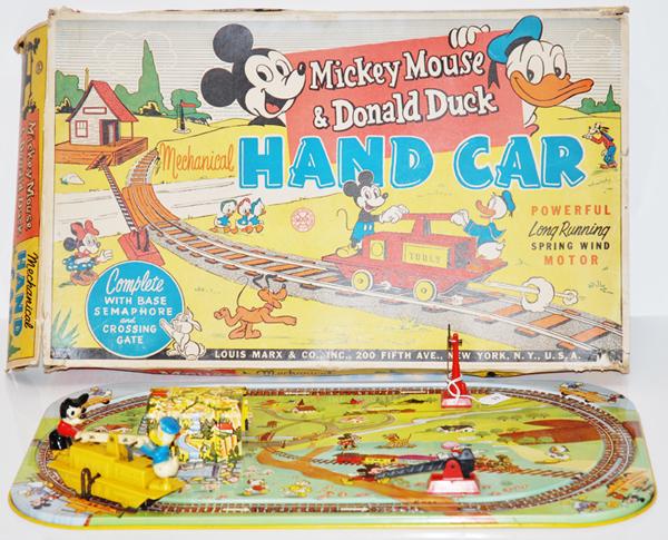 Appraisal: TINPLATE LOUIS MARX MICKEY MOUSE DONALD DUCK HAND CAR WITH