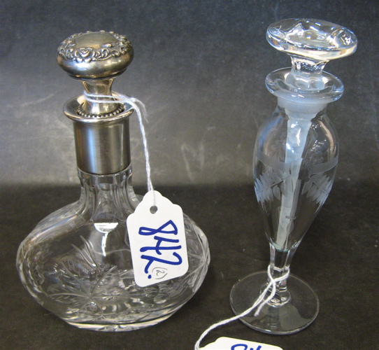 Appraisal: TWO CUT CRYSTAL CLEAR PERFUME BOTTLES One is an engraved