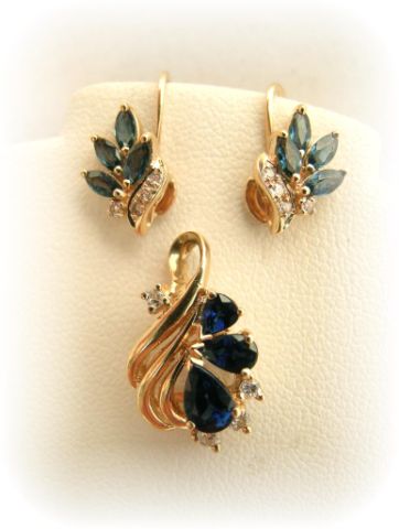 Appraisal: k yellow gold four diamond and four marquise blue sapphire