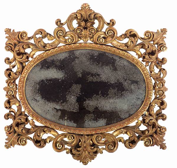 Appraisal: An Italian Rococo style carved giltwood mirror mid th century