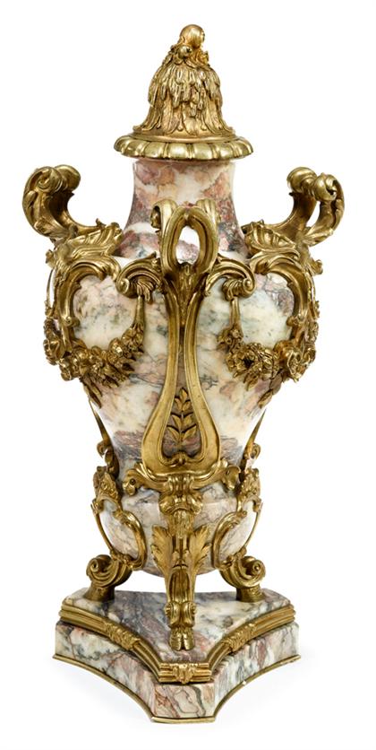 Appraisal: Louis XIV style gilt bronze mounted marble urn Pink and