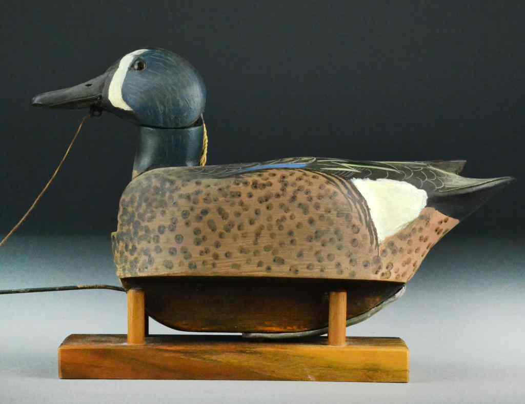 Appraisal: Woodson Roddy Duck Decoy with LeaderFinely painted with glass eyes