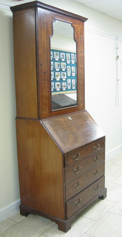 Appraisal: A Georgian mahogany Bureau Bookcase with dentil cornice above single