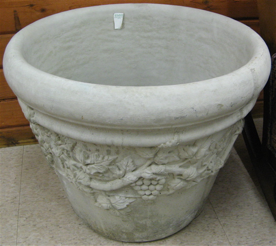 Appraisal: LARGE PAIR OF GARDEN PLANTERS each of solid concrete cast