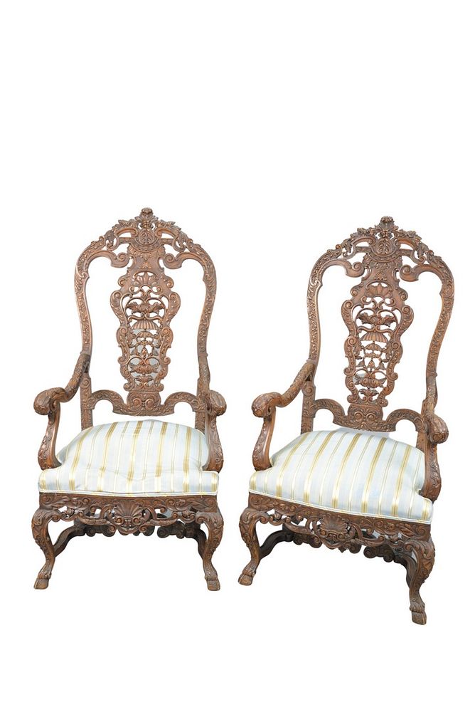 Appraisal: Pair Walnut Continental Style Armchairs with pierce carved backs and