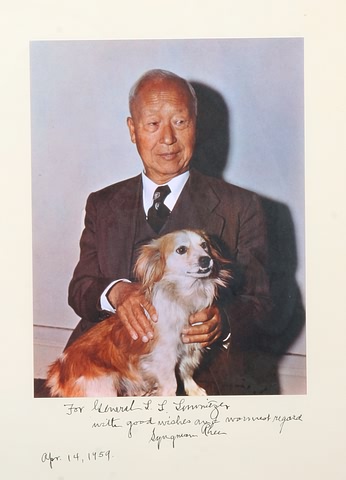 Appraisal: Signed photograph of Rhee with dog with inscription For General