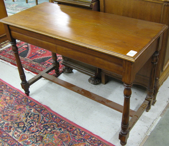 Appraisal: EMPIRE VICTORIAN STYLE MAHOGANY HALL TABLE having a rectangular wood