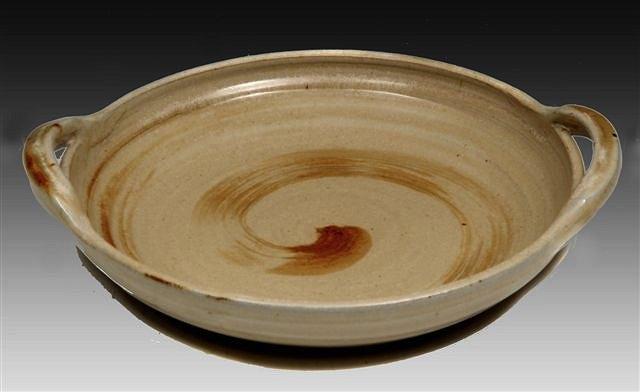 Appraisal: A RAY FINCH EARTHENWARE TWO HANDLED DISH with swirl design