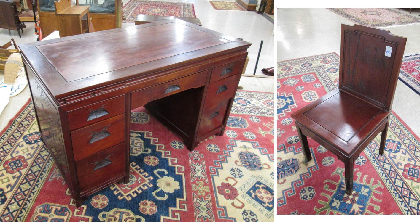 Appraisal: CARVED ROSEWOOD DESK AND MATCHING CHAIR Chinese export mid- th