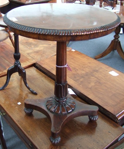 Appraisal: A William IV rosewood occasional table the circle top raised