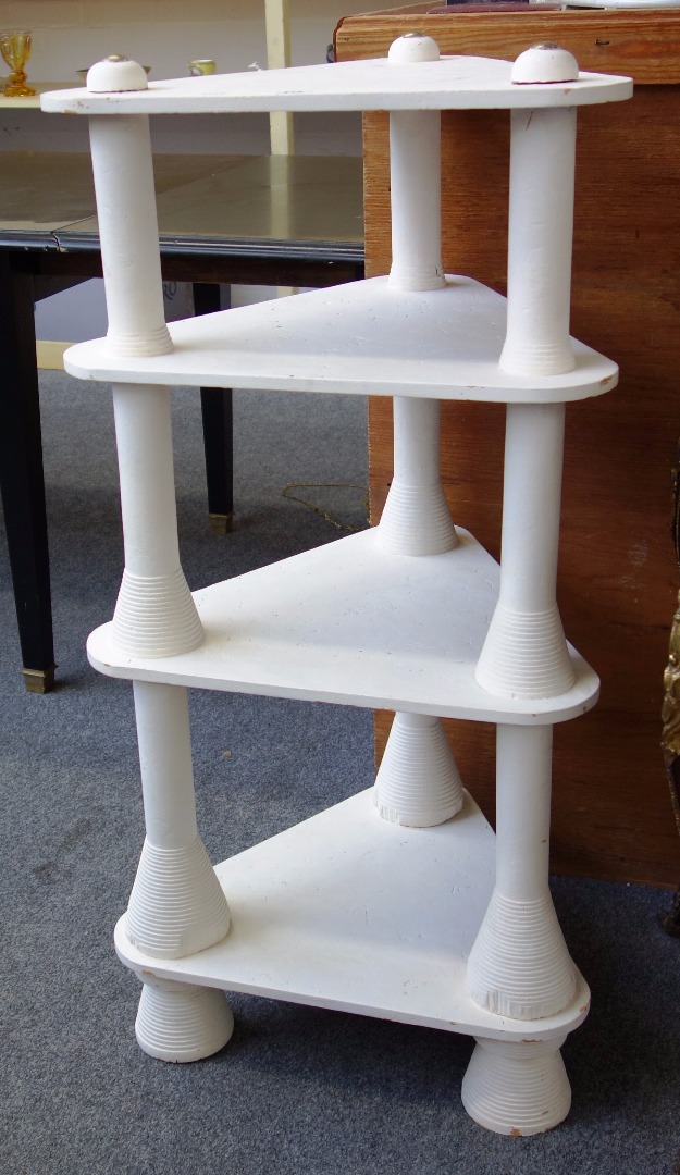 Appraisal: A pair of Moroccan style white painted four tier etageres