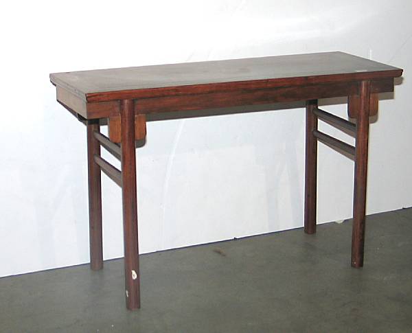 Appraisal: A rosewood painting table With plain top and aprons supported