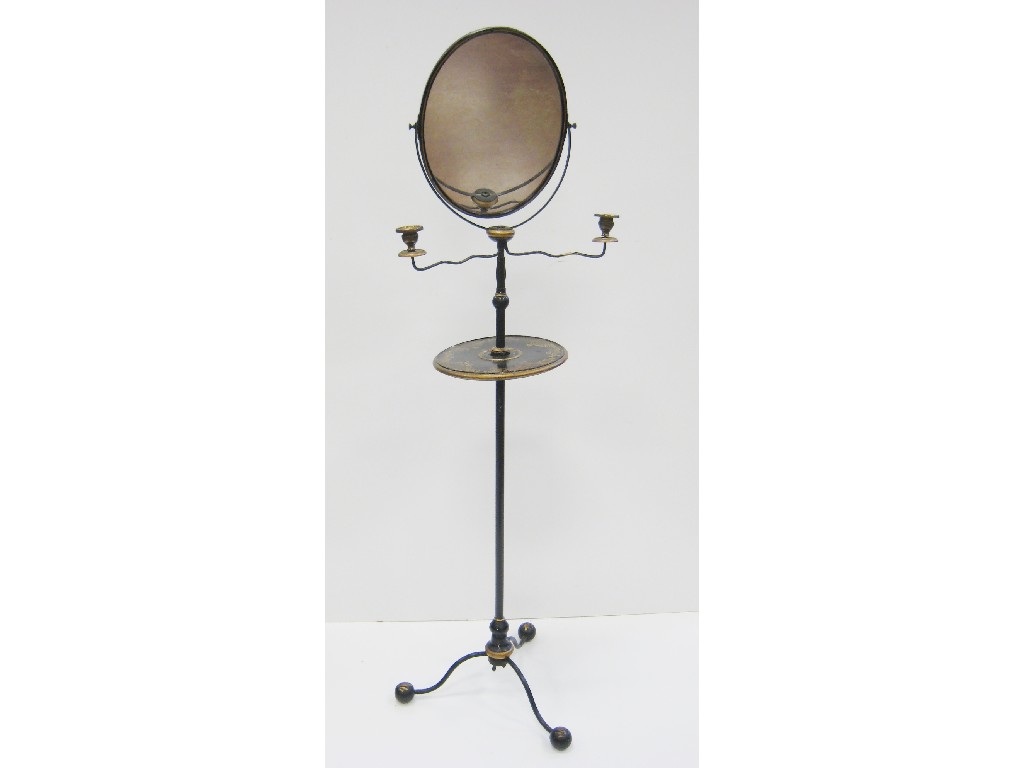 Appraisal: A Victorian free standing shaving Mirror with oval plate pair