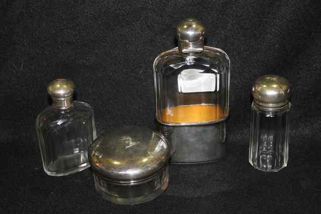 Appraisal: A GLASS HIP FLASK with silver mount and lid together