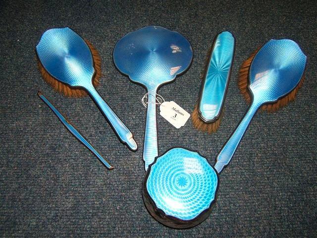 Appraisal: An Edwardian blue enamelled dressing table set consisting of two