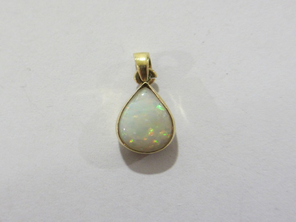 Appraisal: Nine carat gold mounted pear shaped opal pendant