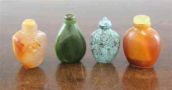 Appraisal: Four Chinese hardstone snuff bottles two in banded agate one