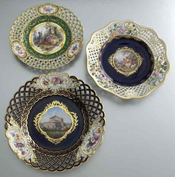 Appraisal: Meissen porcelain cabinet plateswith reticulated rims each having central painted