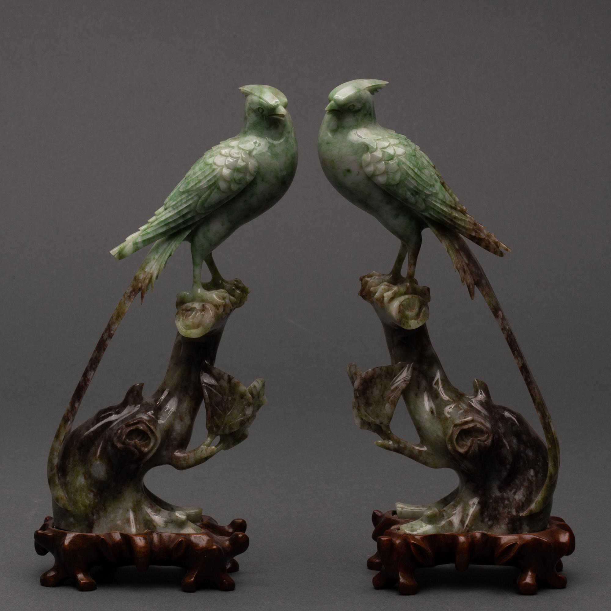 Appraisal: PAIR OF CARVED CHINESE SAUSSURITE BIRDS TH CENTURY Green and