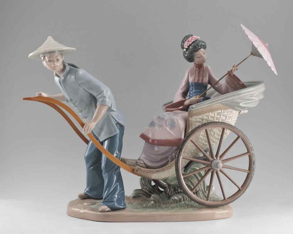 Appraisal: LLADRO PORCELAIN FIGURINE A RICKSHAW RIDE Salvador Debon designer glazed