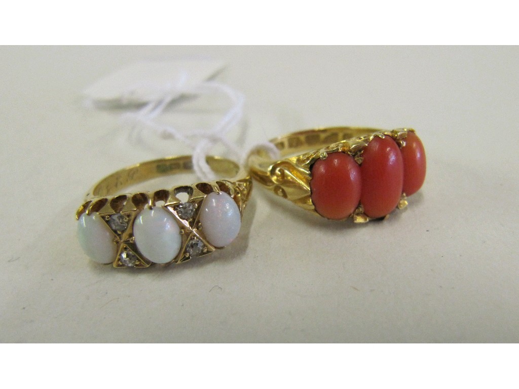 Appraisal: Lot comprising ct gold coral three stone ring and a