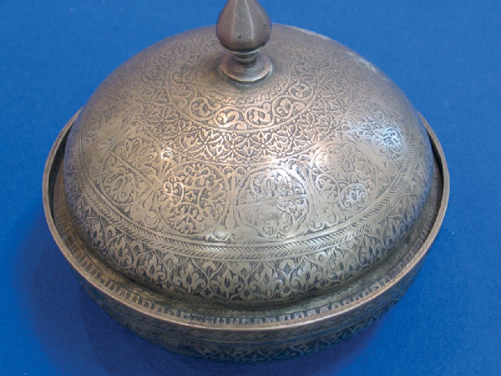 Appraisal: AN ISLAMIC TINNED COPPER BOWL possibly from Mesopotamia with engraved