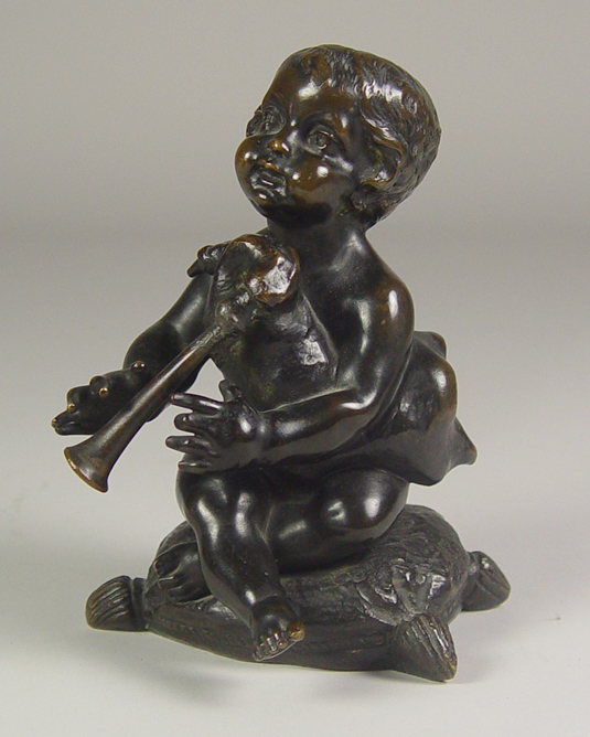 Appraisal: Bronze Cherub Figure Cast bronze cherub playing bagpipe seated on