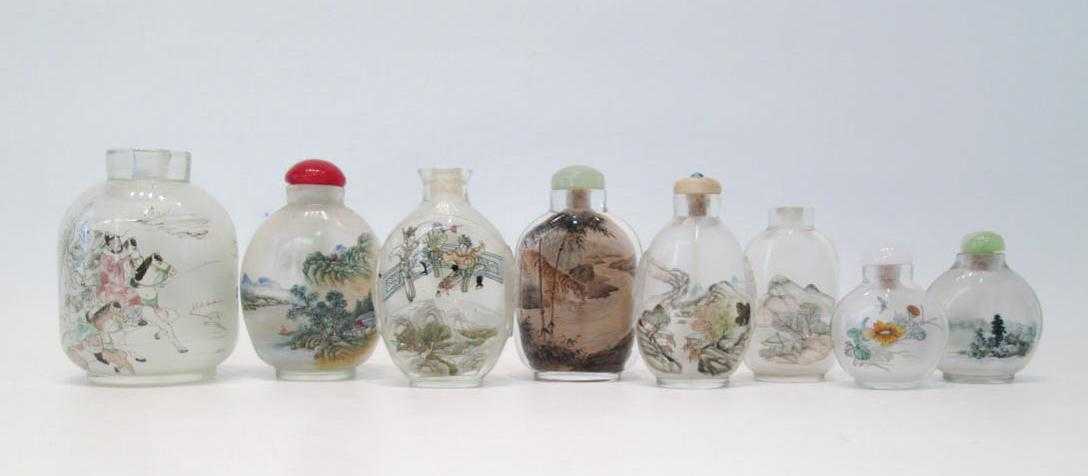 Appraisal: EIGHT CHINESE REVERSE PAINTED GLASS SNUFF BOTTLES of flattened ovoid