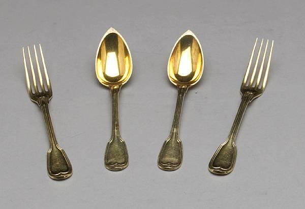 Appraisal: An assembled French standard silver gilt partial dessert flatware setVarious