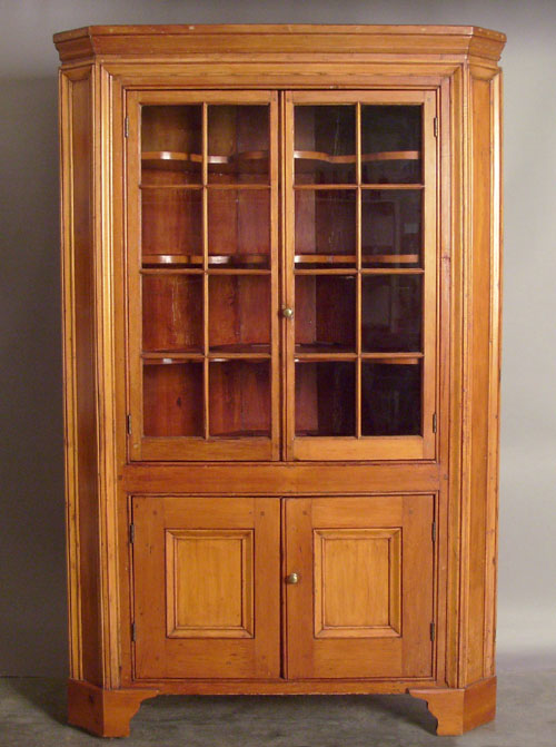 Appraisal: Pine one piece corner cupboard th c h w