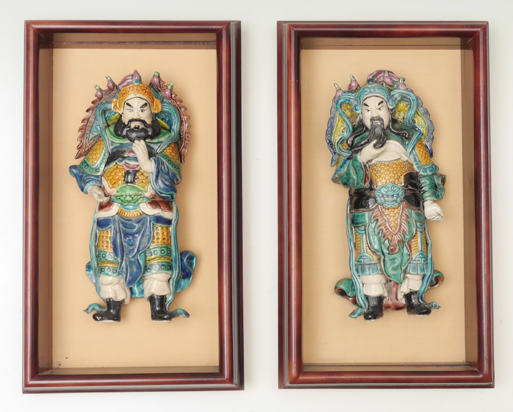 Appraisal: PAIR OF FRAMED CHINESE POLYCHROME FIGURES piece polychrome decorated pottery