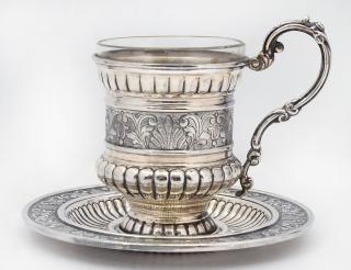 Appraisal: STERLING SILVER CUP AND SAUCER Italian With glass insert In