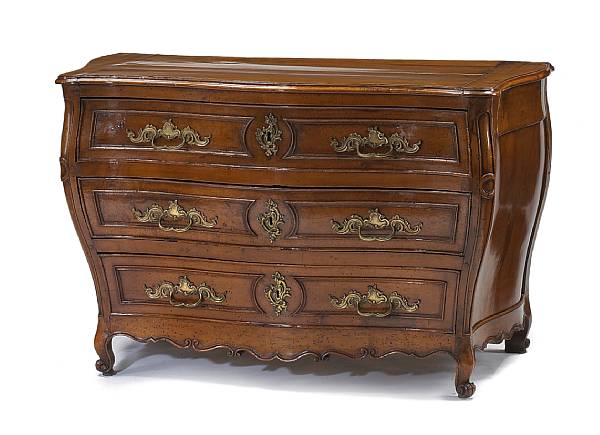 Appraisal: A Louis XV bronze mounted fruitwood commode en tombeau Bordeauxmid