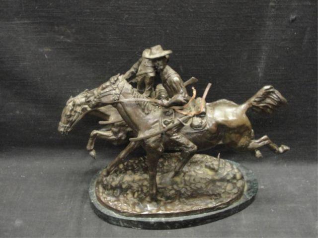 Appraisal: Remington Style Bronze Cowboys on Horseback Dimensions w x h